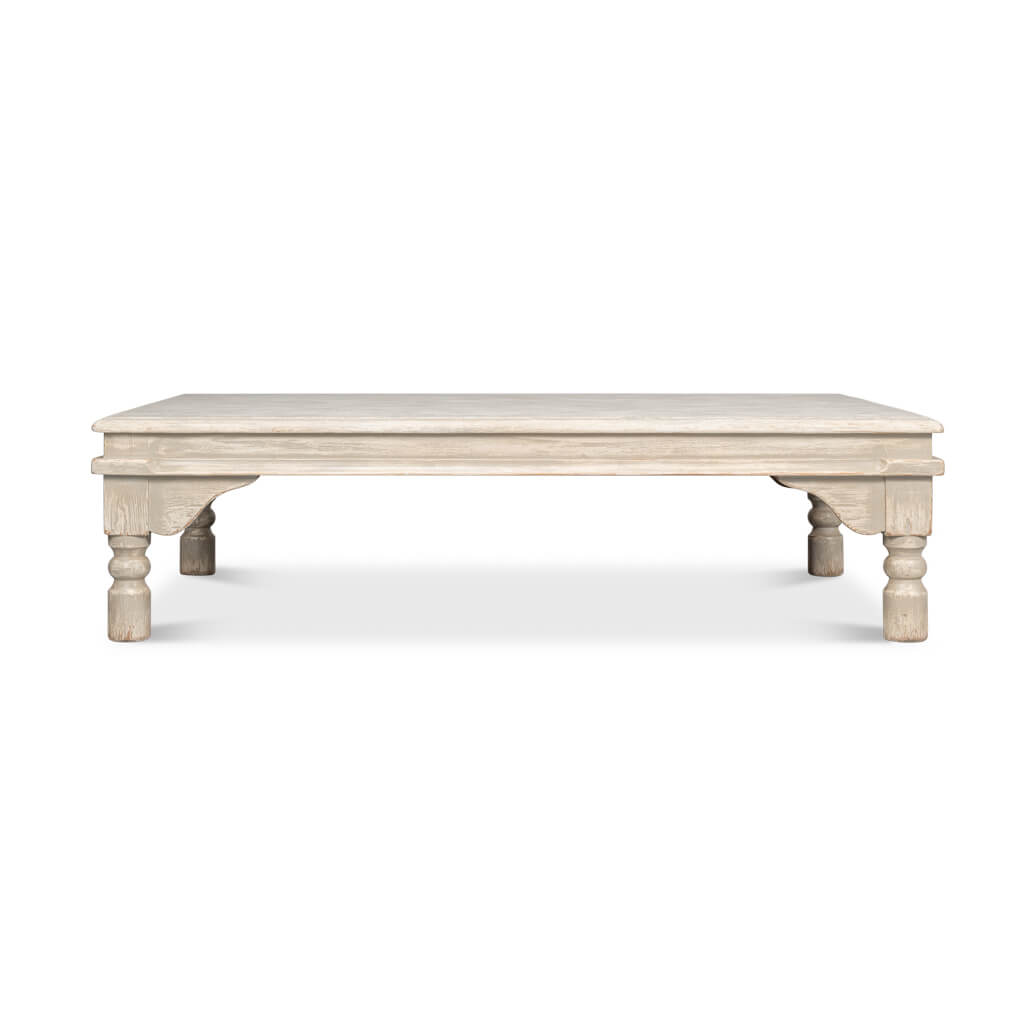 Wider front view of washed gray lowrise coffee table.