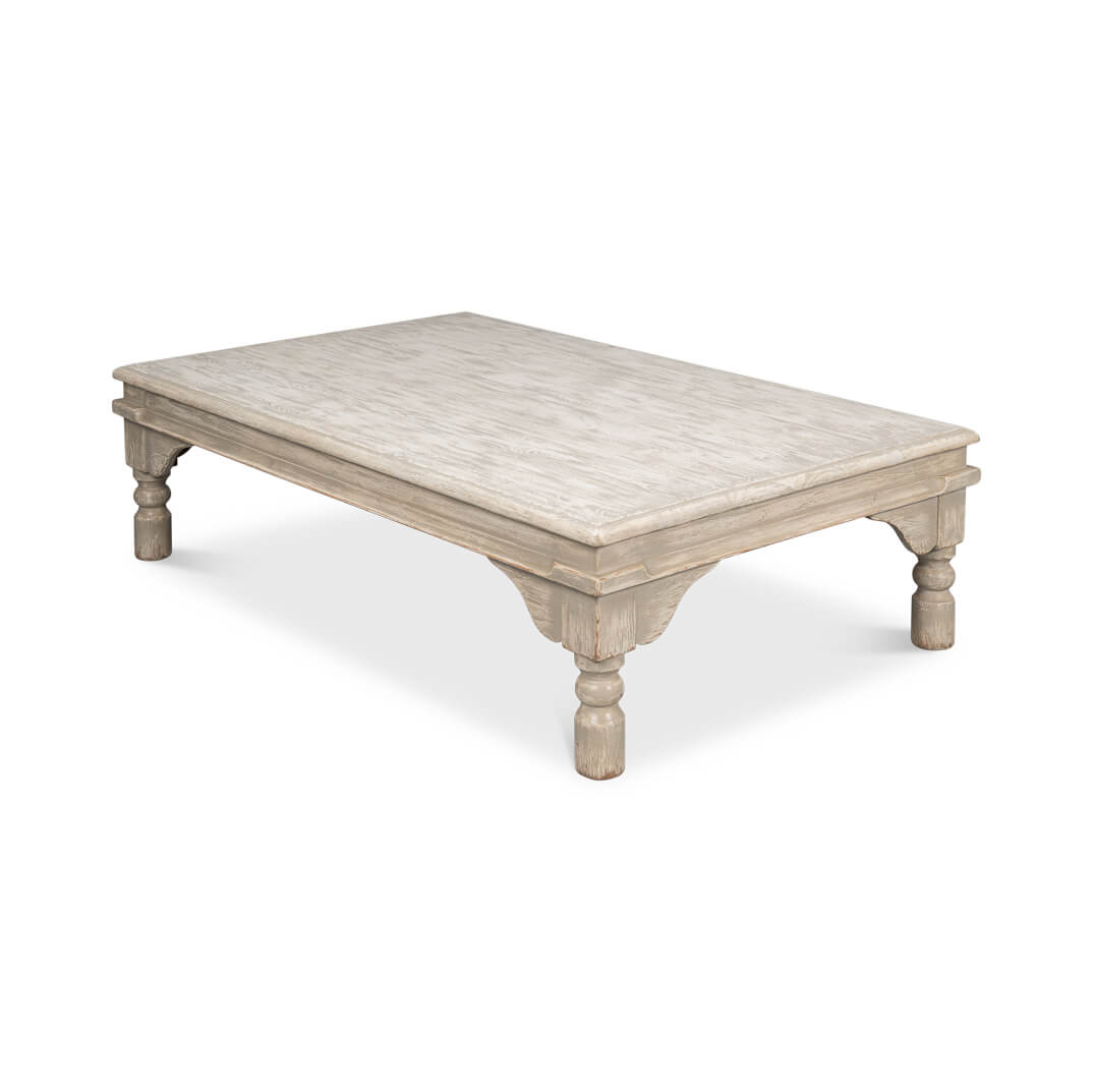 Alternate angled view of washed gray lowrise coffee table.