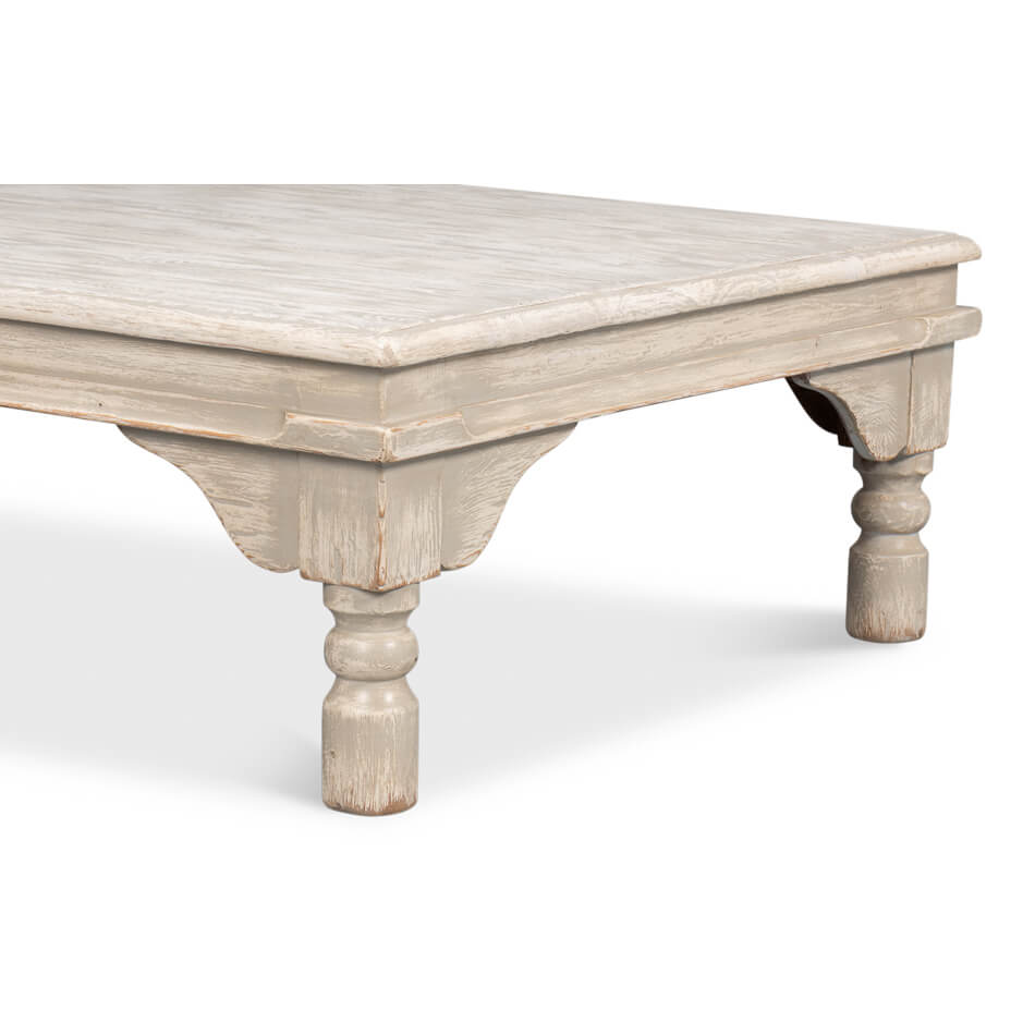 Detailed leg and corner, washed gray coffee table.