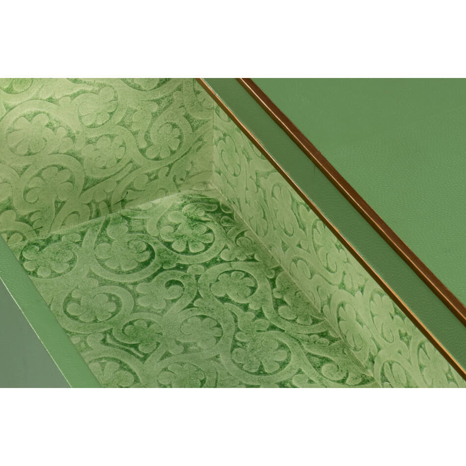 Decorative interior pattern of green nightstand drawer.