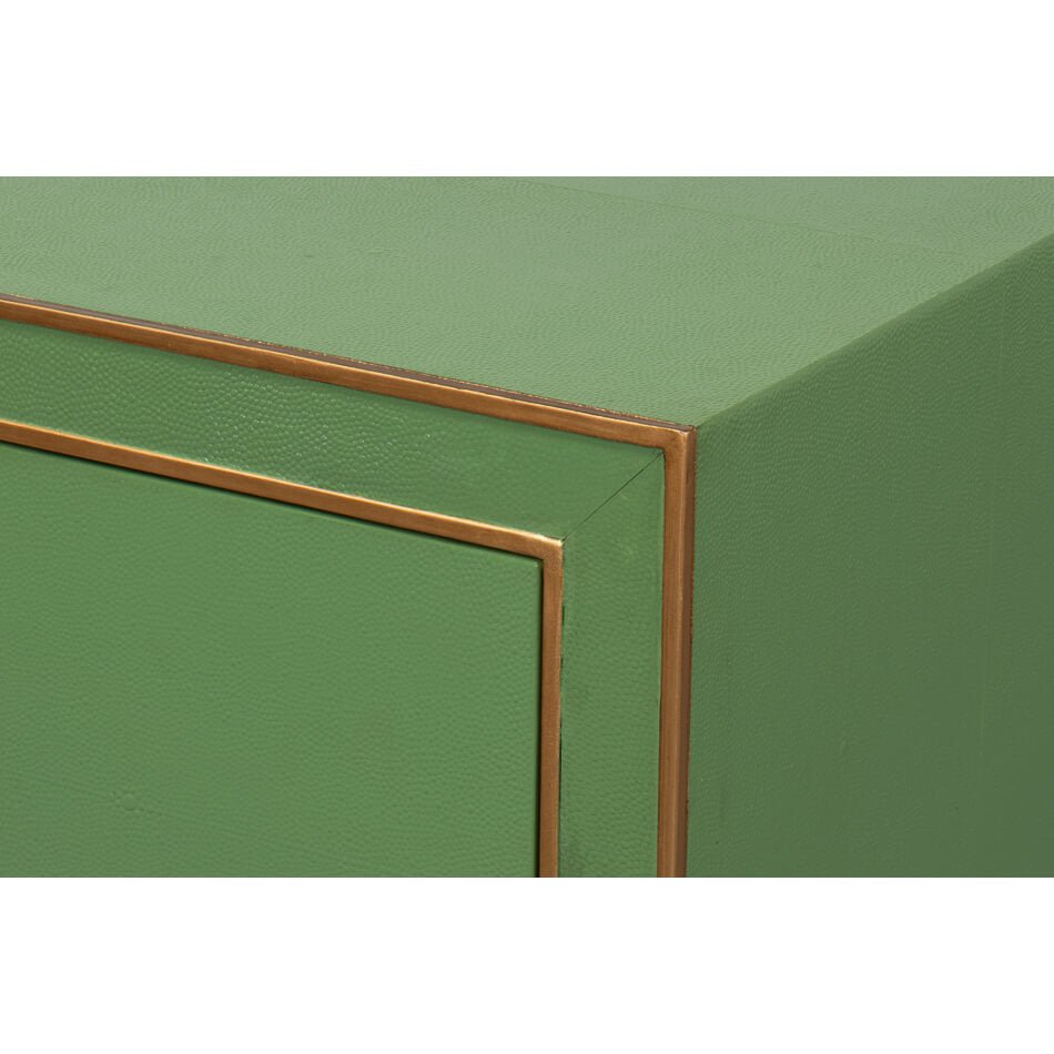 Corner detailing on green modern nightstand.