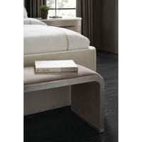 Waterfall velvet bench in elegant bedroom, book on top.