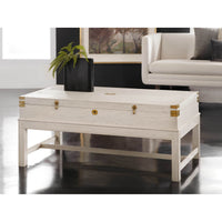 White campaign coffee table in modern living room setting.