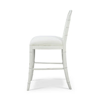 Side view of white Chippendale counter stool.