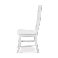 White ladder back dining chair side profile.