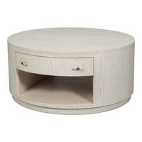 Round white drum coffee table with storage drawer and open lower shelf