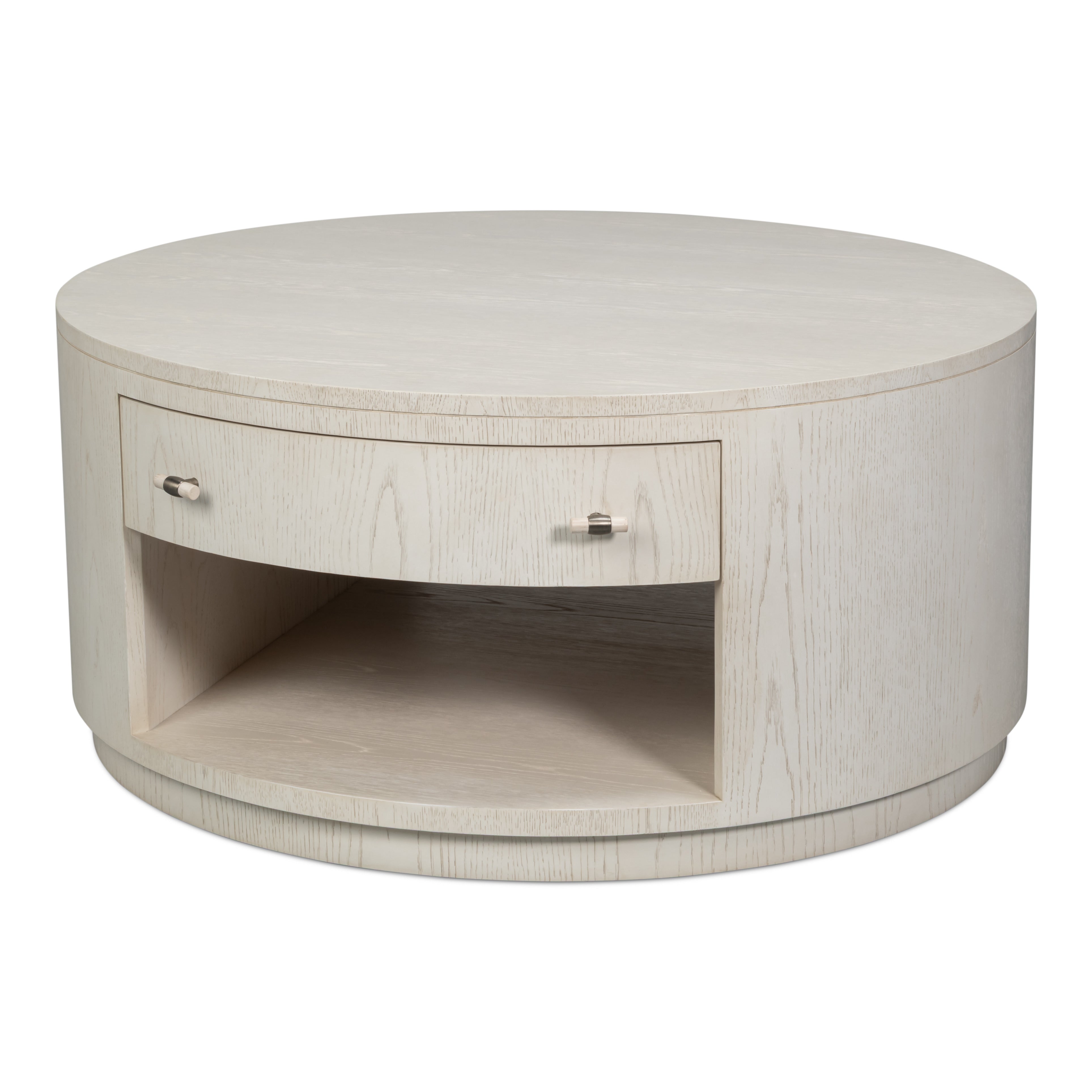 Round white drum coffee table with storage drawer and open lower shelf