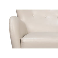White leather wing chair seat and backrest detail.