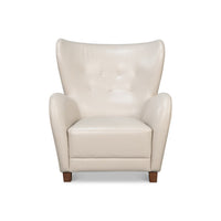 White leather wing chair front view.