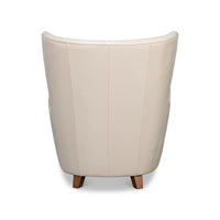 White leather wing chair back view.