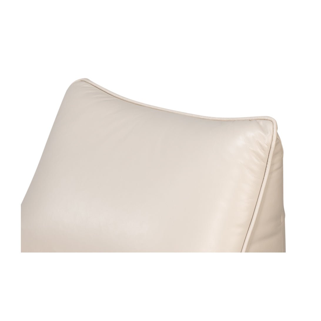 Upper cushion detail of white leather swivel chair