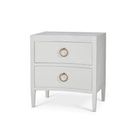 White modern nightstand with two drawers, angled view.