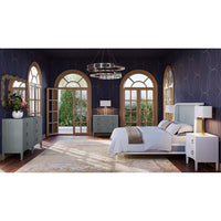 Elegant bedroom with modern nightstand and matching furniture.
