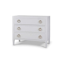 Front angled view of white modern chest of drawers.