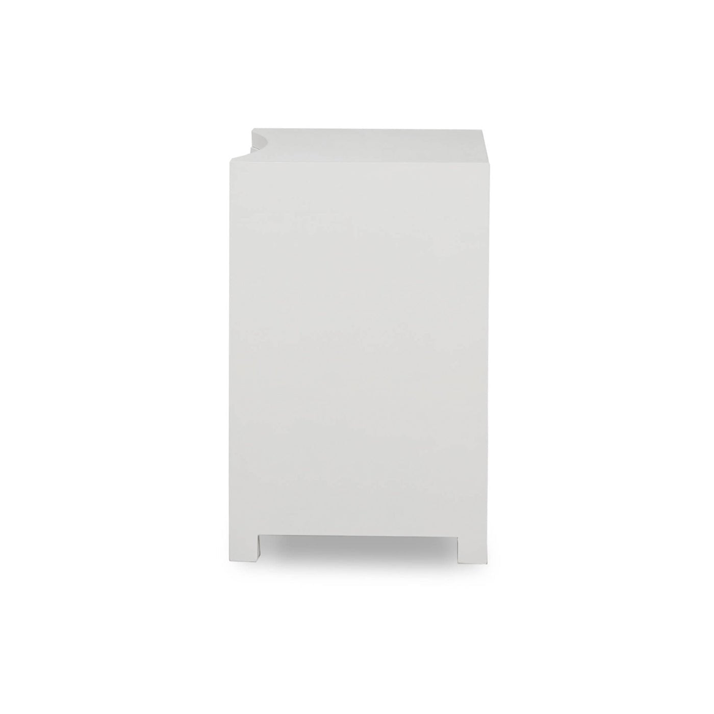 Side view of white linen wrapped nightstand.