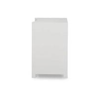 Side view of white linen wrapped nightstand.