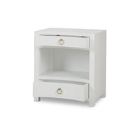 White linen nightstand with open drawers, gold handles.