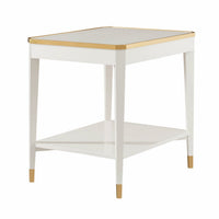 White mid-century end table with gold accents, empty.