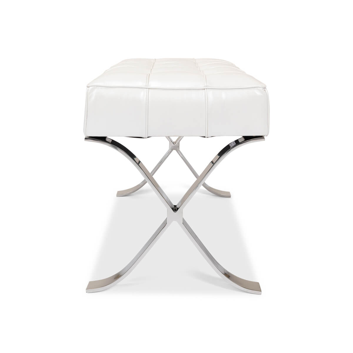 White leather stool side view with X-shaped legs.