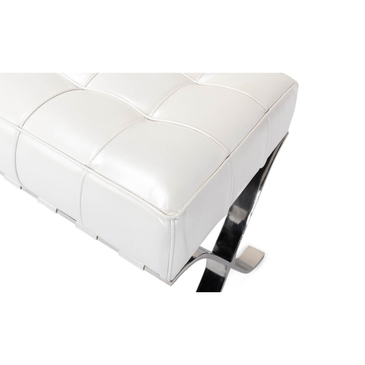 White leather stool corner close-up.