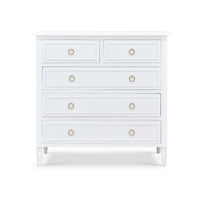 Front view of white chest of drawers.