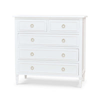 White chest of drawers, front perspective view.