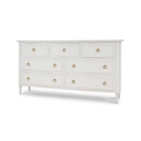 White antique dresser with seven drawers, front view.