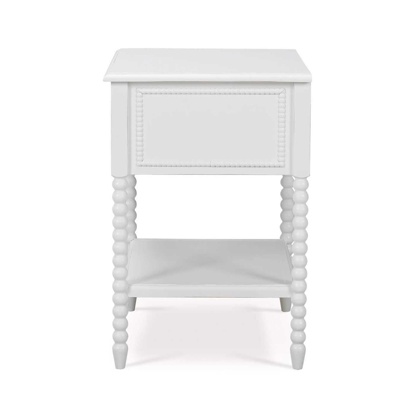 White nightstand side view, beaded legs, smooth panel.