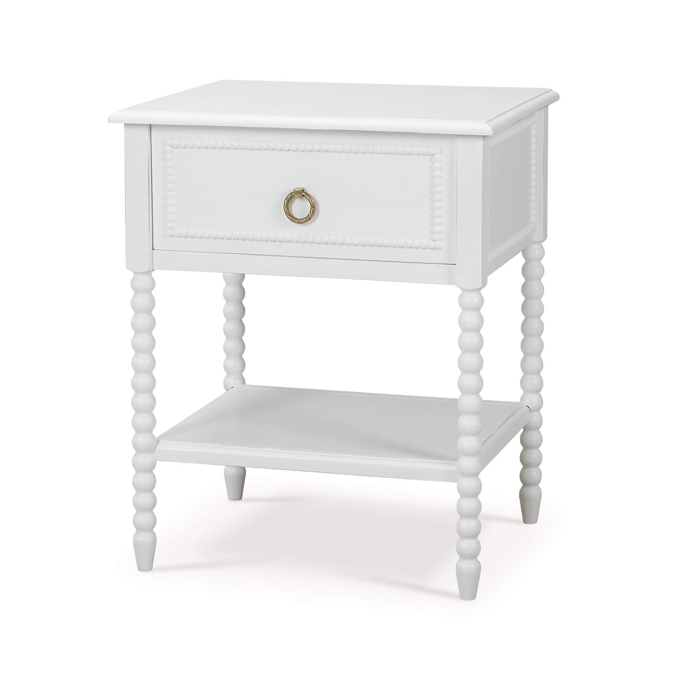 White nightstand angled view, beaded legs, drawer closed.