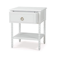 White nightstand angled view, drawer open, beaded legs.