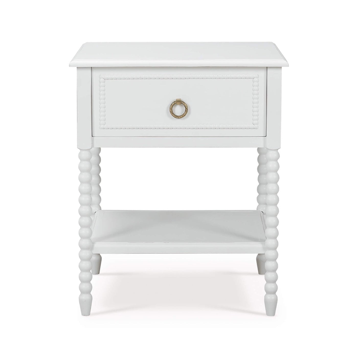 White nightstand front view, beaded legs, drawer closed.