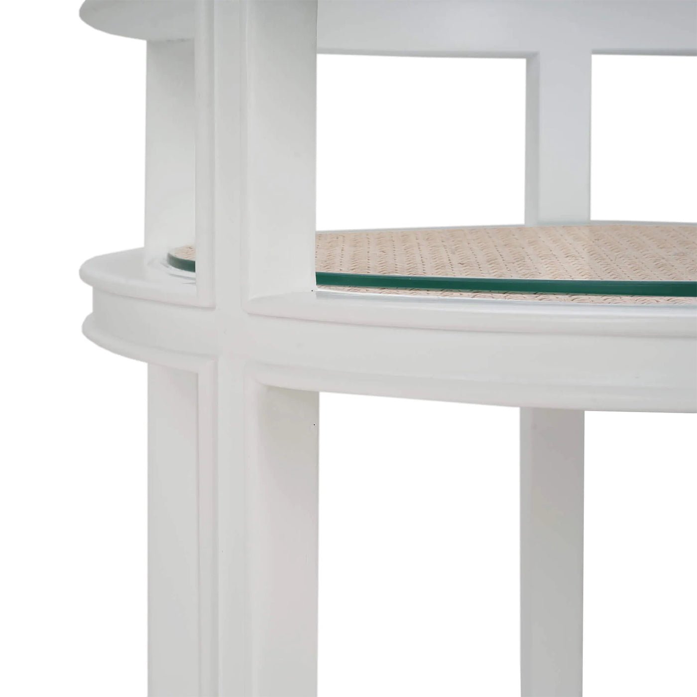 Detailed view of bar cart with clear top and white frame.