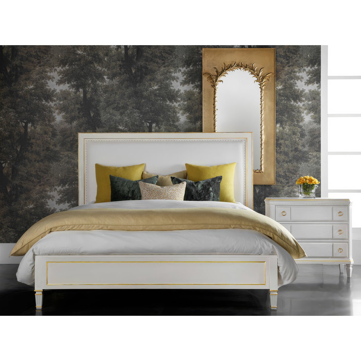Bedroom with white king platform bed, nightstand, and mirror.