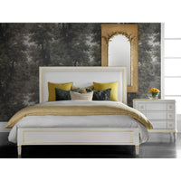 Bedroom with white king platform bed, nightstand, and mirror.