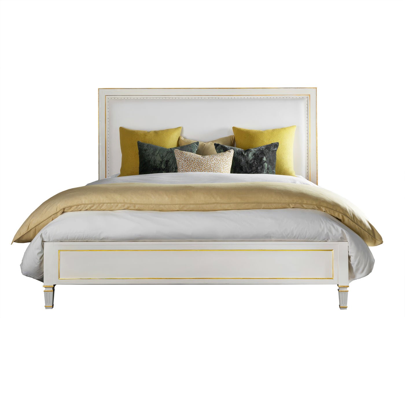 White king platform bed with yellow and gray pillows.