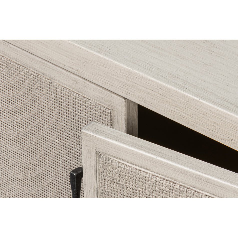 Side cabinet, door detail, woven panel texture.