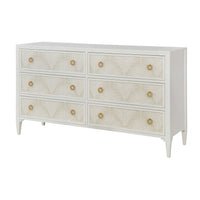White six-drawer dresser with palm design.