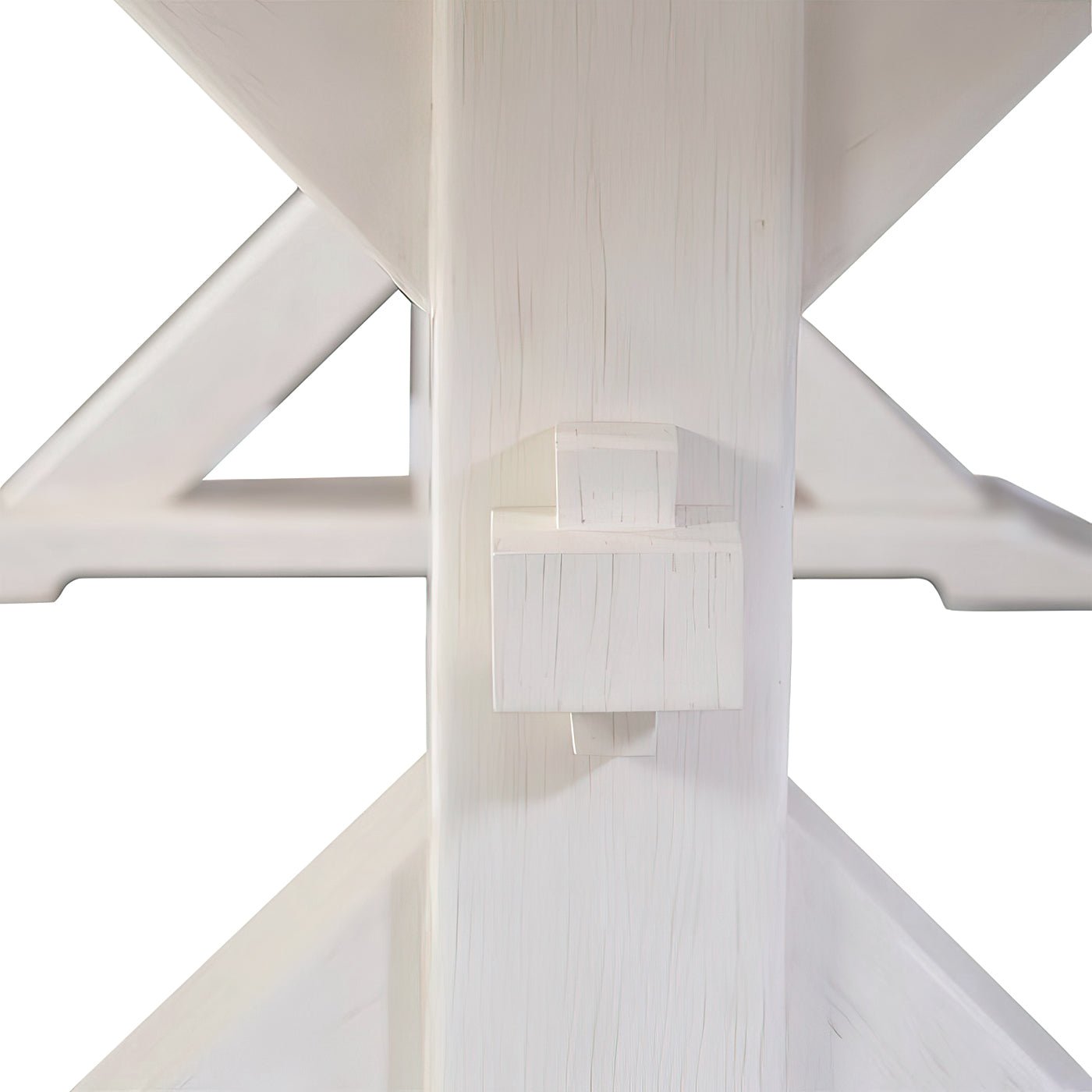 Close detail of trestle structure, white dining table.