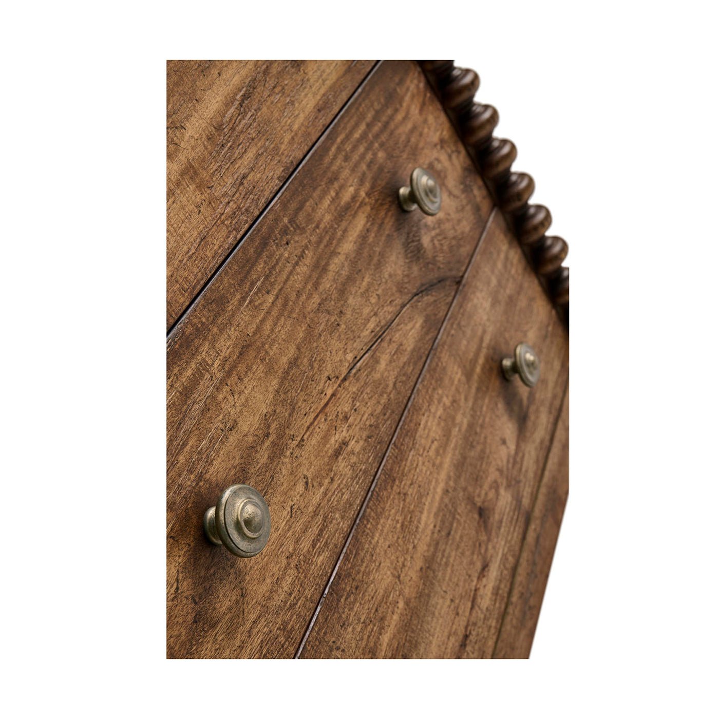 Close-up of nightstand drawers, highlighting wood texture and knobs.