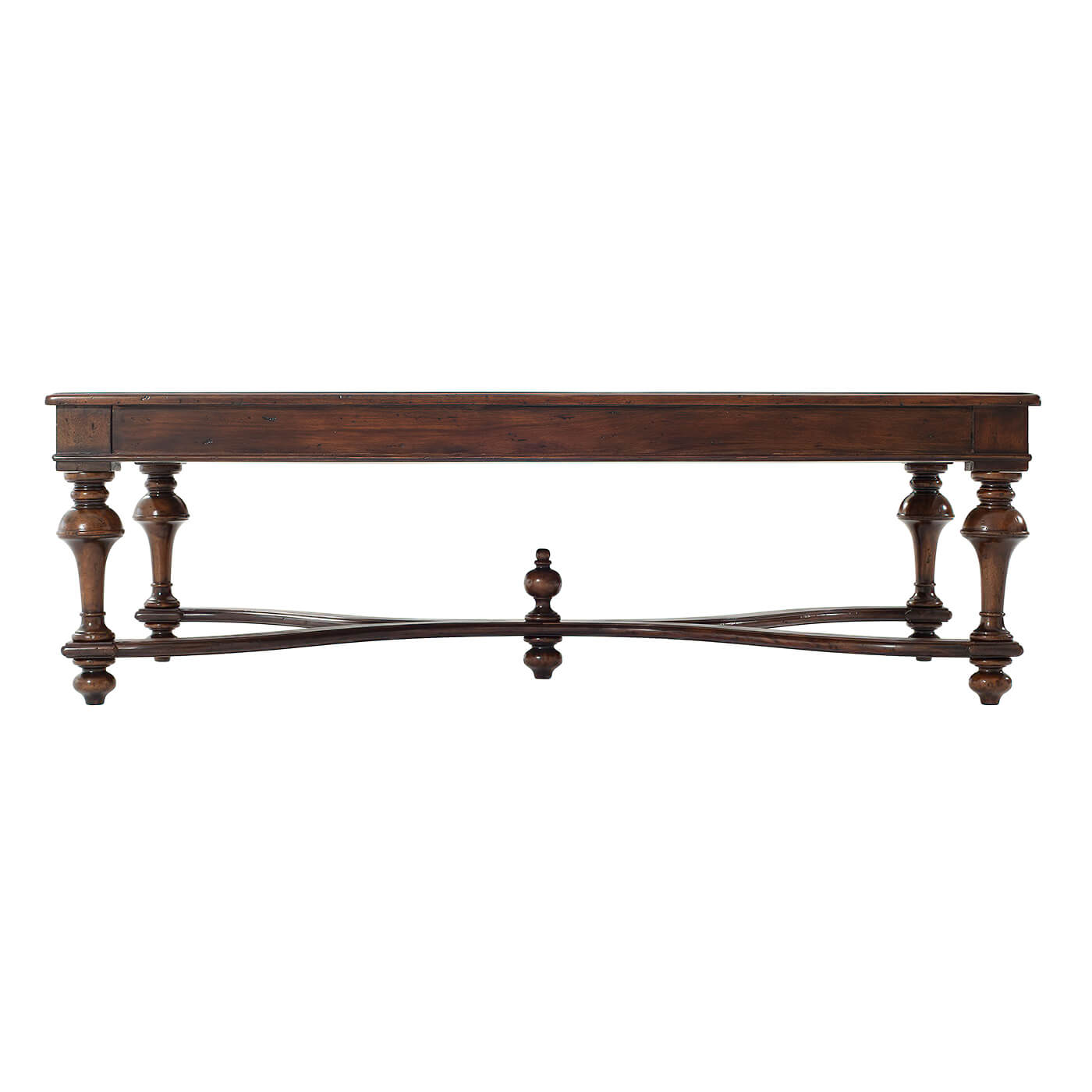 Side profile of wooden coffee table showing intricate legs.