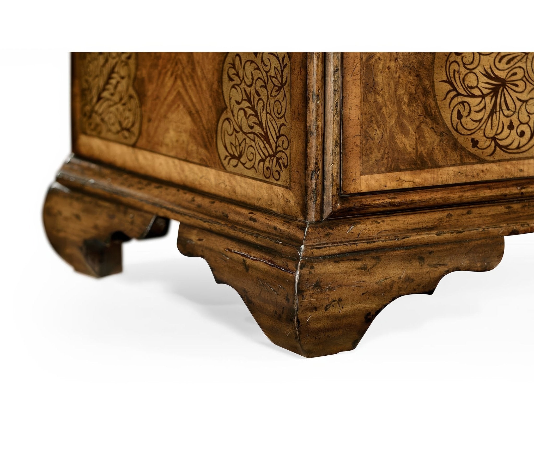 Cabinet base close-up, detailed woodwork on foot.