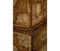 Side detail, intricate marquetry design on cabinet surface.