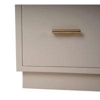 Close-up of drawer handle on wooden storage cubby.