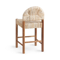 Three-quarter rear view of the natural woven abaca counter stool showing the arched back and teak frame