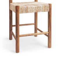 Close-up of the natural abaca seat, teak legs and built-in wood footrest