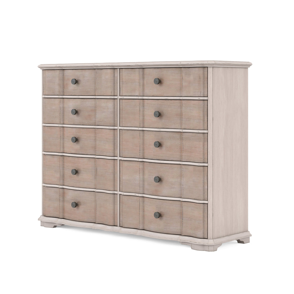 Wide washed maple dresser with shaped drawer fronts, angled view