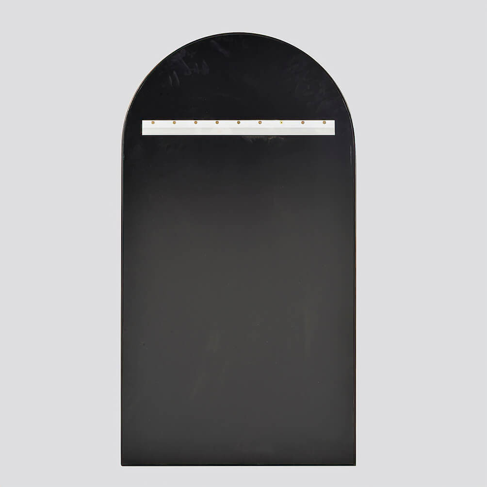 Back of arch mirror showing hanging mechanism.