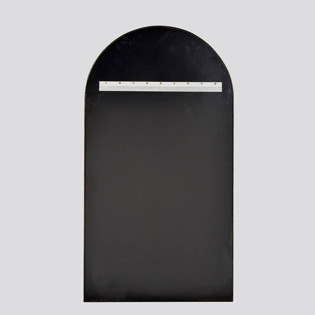 Back view of arch mirror with mounting hardware.