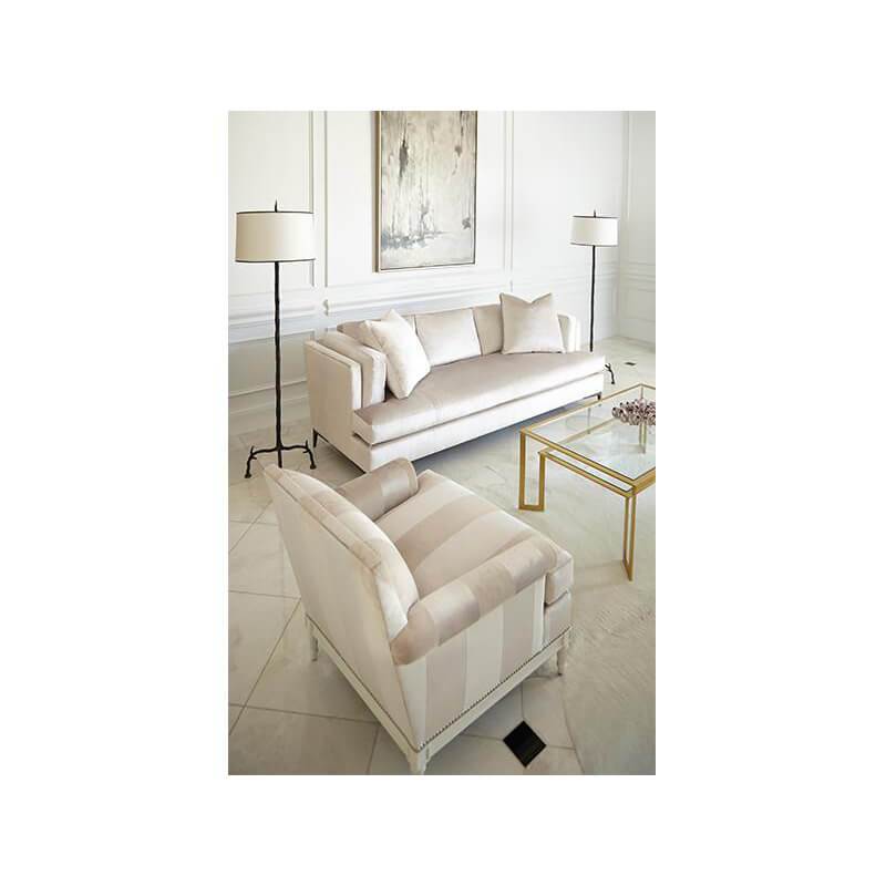 French 18th Century inspired armchair in elegant living room.