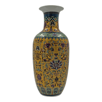 Side view of Chinese export yellow vase, elaborate design.